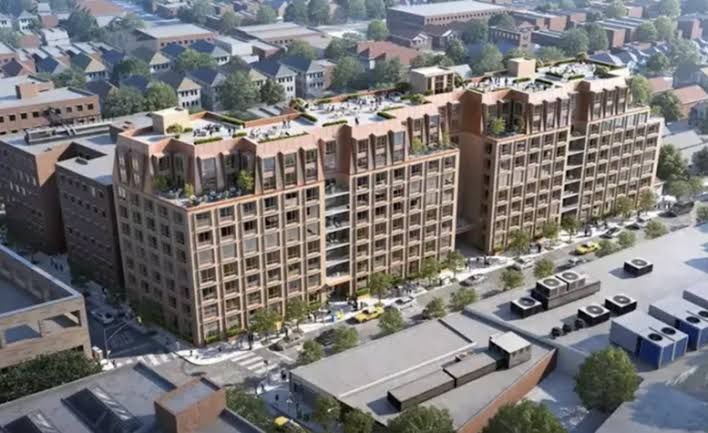 Nine-story residential building design for 1214-1238 East 14th Street in Midwood with tan brick and balcony stacks.