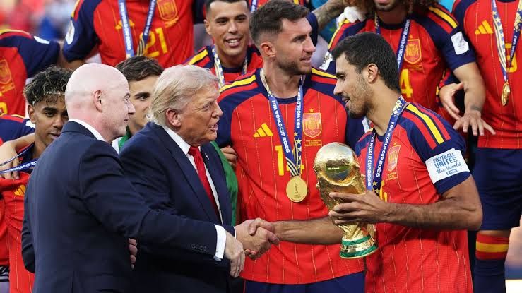 Spain players celebrate their 2026 World Cup championship victory on the pitch after the final match against Argentina.