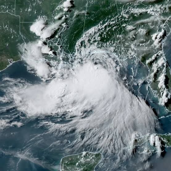 Satellite view of Tropical Storm Bertha swirling over the Gulf Coast near the Louisiana shoreline.