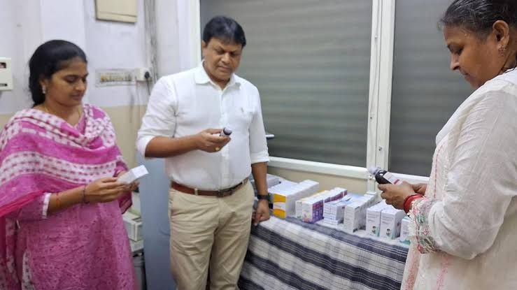 Telangana Drugs Control Administration officials inspecting seized medicine stock during a raid in Hyderabad.