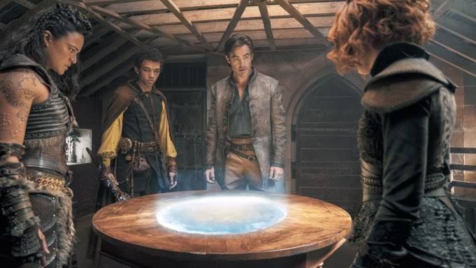 Cast members from Dungeons and Dragons: Honor Among Thieves, including Chris Pine and Michelle Rodriguez, on screen.