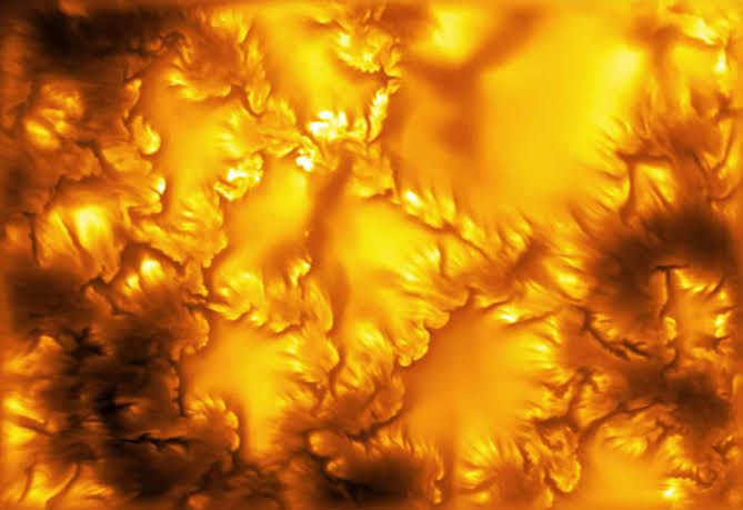 Close-up view of the Sun's surface showing swirling magnetic plasma patterns captured by the Inouye Solar Telescope.
