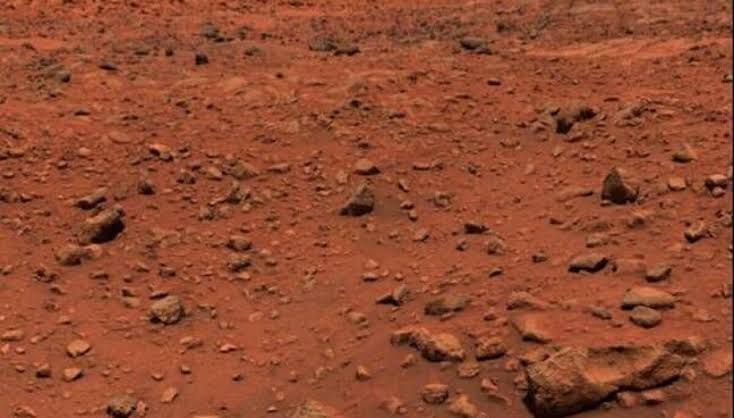 The Viking 1 lander resting on the rocky surface of the Martian plain known as Chryse Planitia.