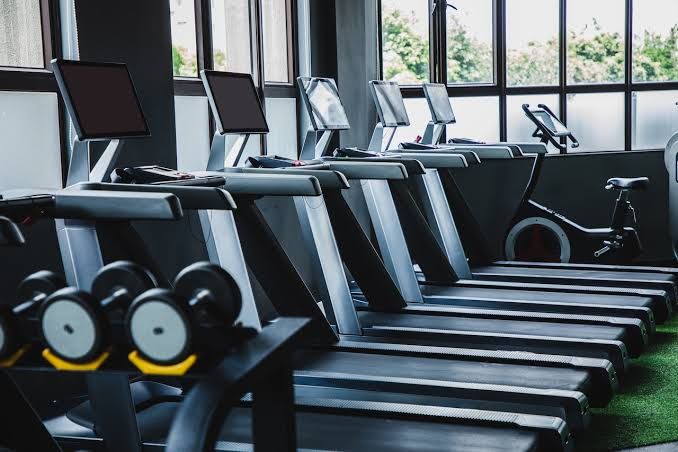 Onelife Fitness signage displayed on a local gym facility in Huntsville, Alabama following the acquisition.