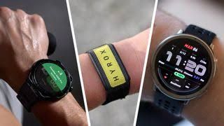 A close-up of a person wearing an Amazfit fitness tracker on their wrist while running outdoors.