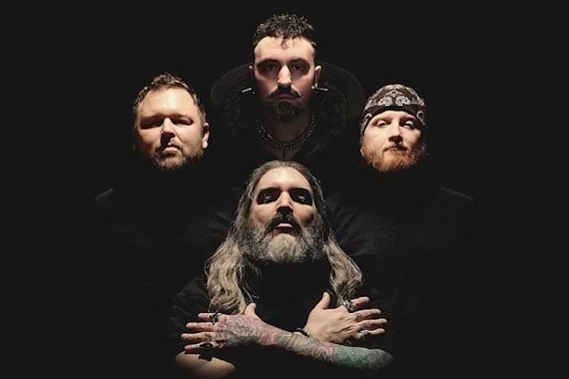 All Shall Perish band members pose for a promotional photo ahead of their 2026 tour and album release.